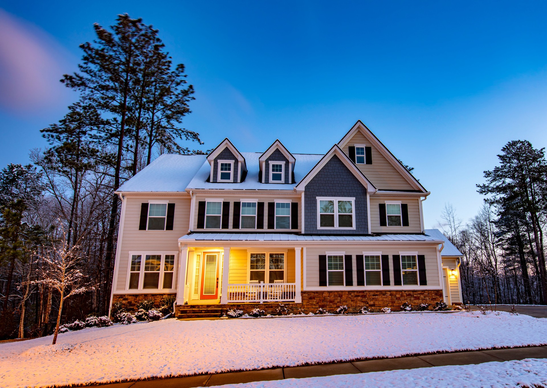 Beautiful American luxury home on a snowy morning